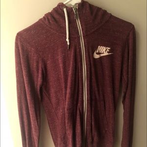 A burgundy zip up hoodie from nike!